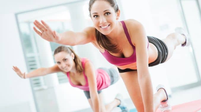 women doing pilates workout