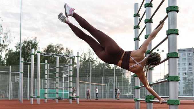woman-doing-human-flag-exercise - Human Flag