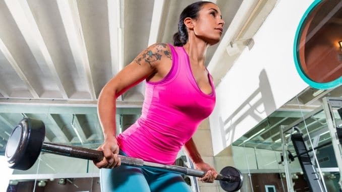 woman workout barbell
