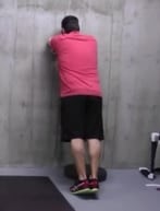 Wall Plank in Forearms Position