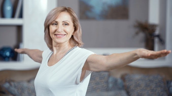 senior woman practicing yoga