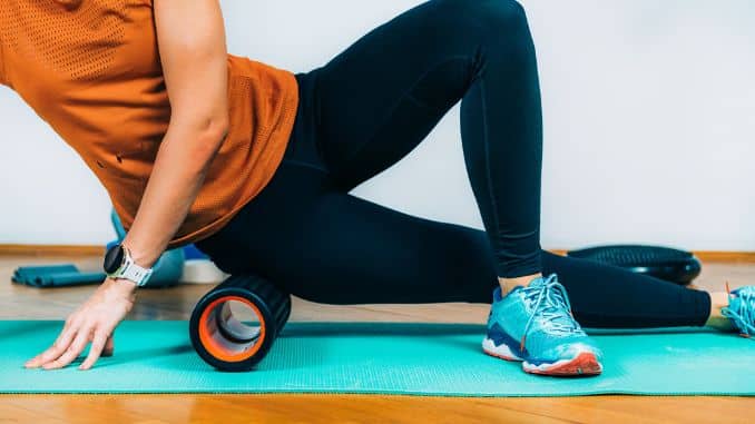 woman-using-foam-roller-massager (2) woman-using-foam-roller-massager