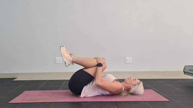 Knee-to-Chest Stretch- back pain relief exercises