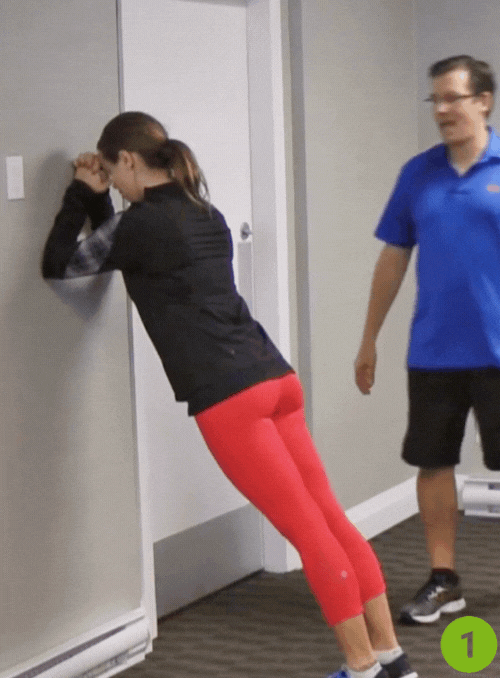 Wall Plank with Leg Kicks