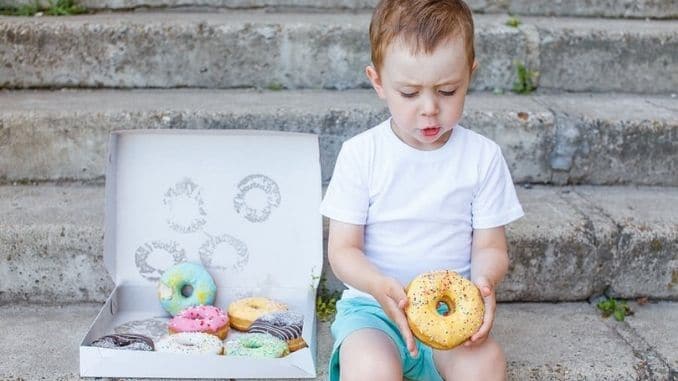 kid-eating-donut  - Fun Facts About Donuts