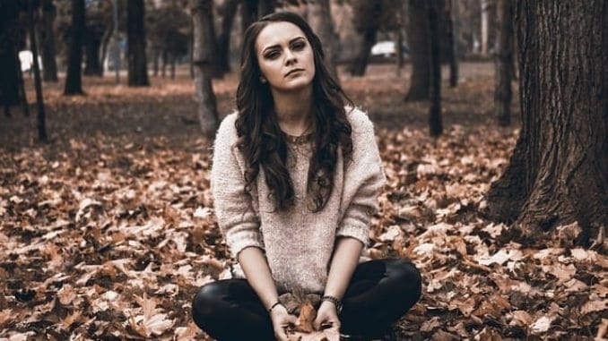 sad-girl-woods - Natural Solutions For Depression