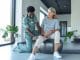 physiotherapist-guiding-woman-knee