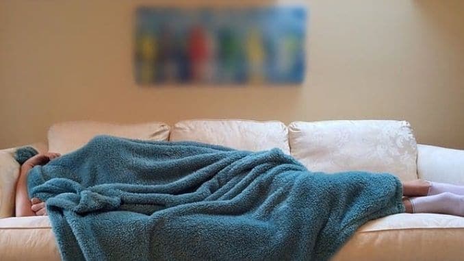 sleeping-couch- natural ways to prevent the flu