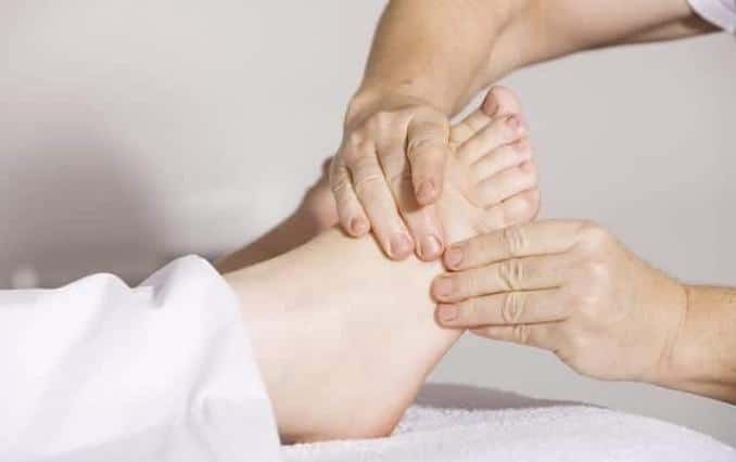foot massage - Dangers of Wearing High Heels