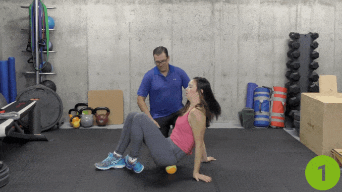 Tennis Ball Into the Glutes- how to increase hip flexibility