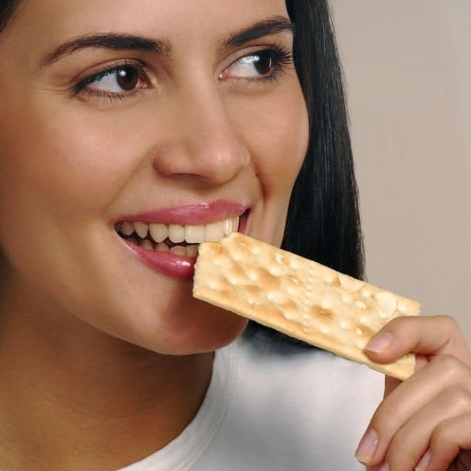 woman-eating-cracker-cookie