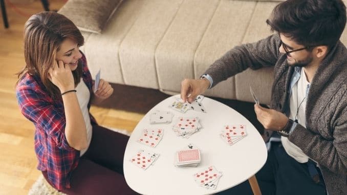 Couple-playing-cards.