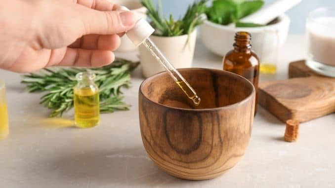 hand-dropping-essential-oil