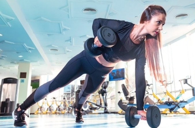 woman-doing-exercise-inside-gym