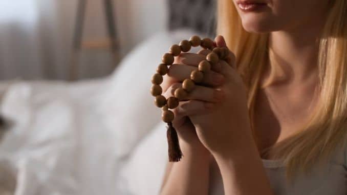beads-praying-in-bedroom  - Create a Better Bedtime Routine