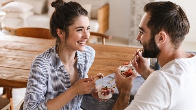 brunette-couple-eating-panna-cotta