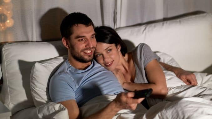 couple-watching-tv - Create a Better Bedtime Routine