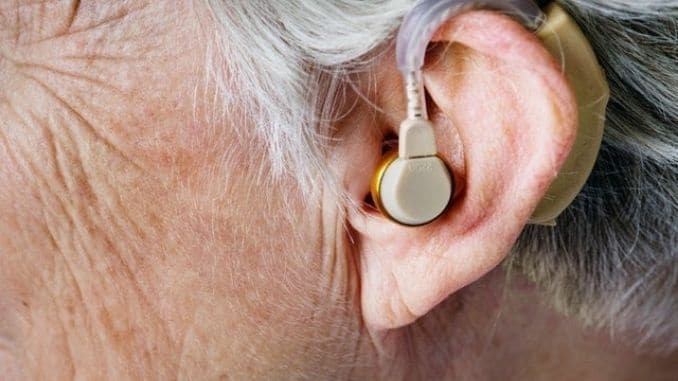 person-wearing-hearing-aid