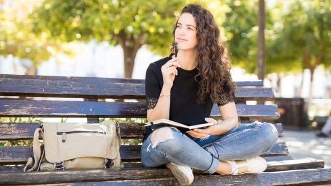 woman-studying-outdoors