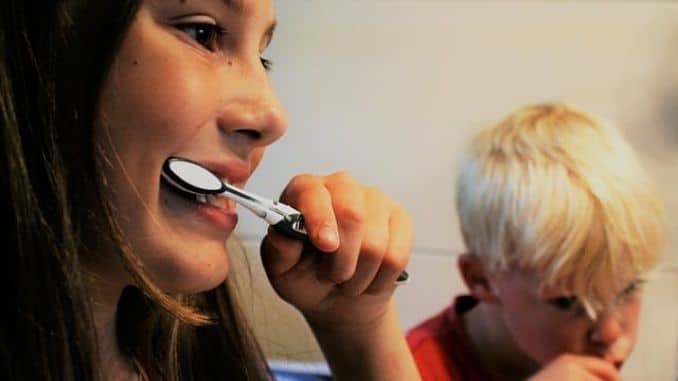 brushing-teeth-tooth - Ways to Use Baking Soda in Your Personal Care Routine