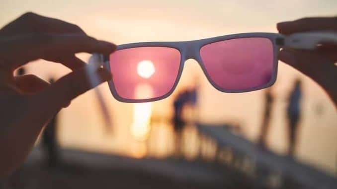 through-pink-sunglasses - 14 Things Wealthy People Don't Do