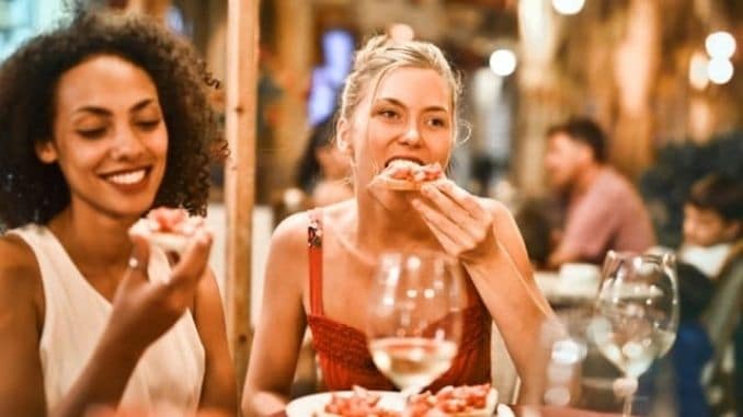 woman-eating-bruschetta