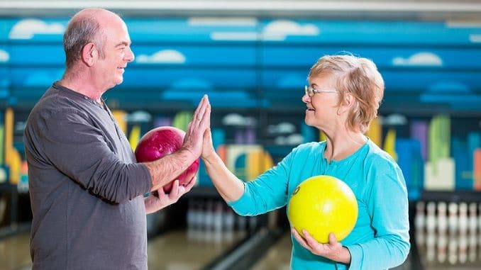 senior couple bowling