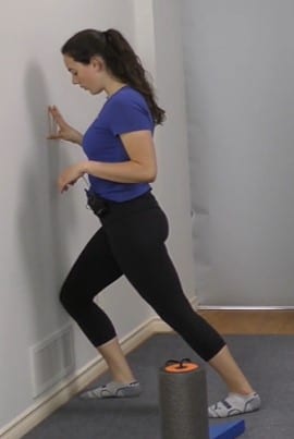 knee to wall stretch