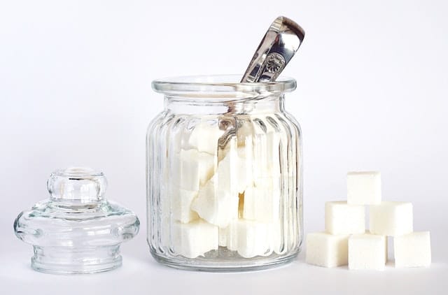 close-up-photo-of-sugar-cubes-in-glass-jar