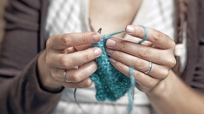 Adult woman knits