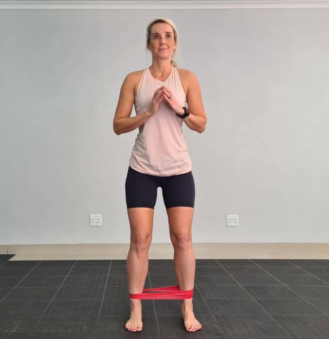 Sidestep with a resistance band 1-Knee Stretches