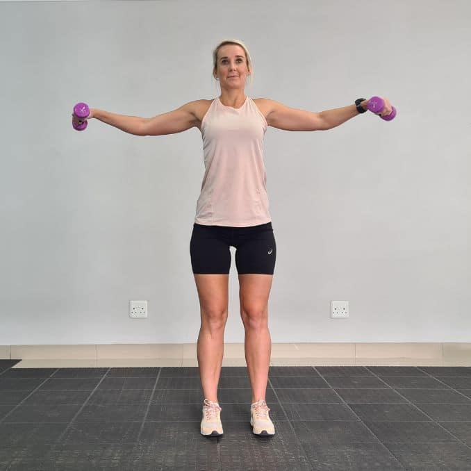 Lateral Arm Raise Anterior view End - Building Shoulder Muscles