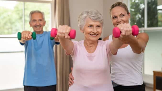senior-couple-exercising-using-dumbbells