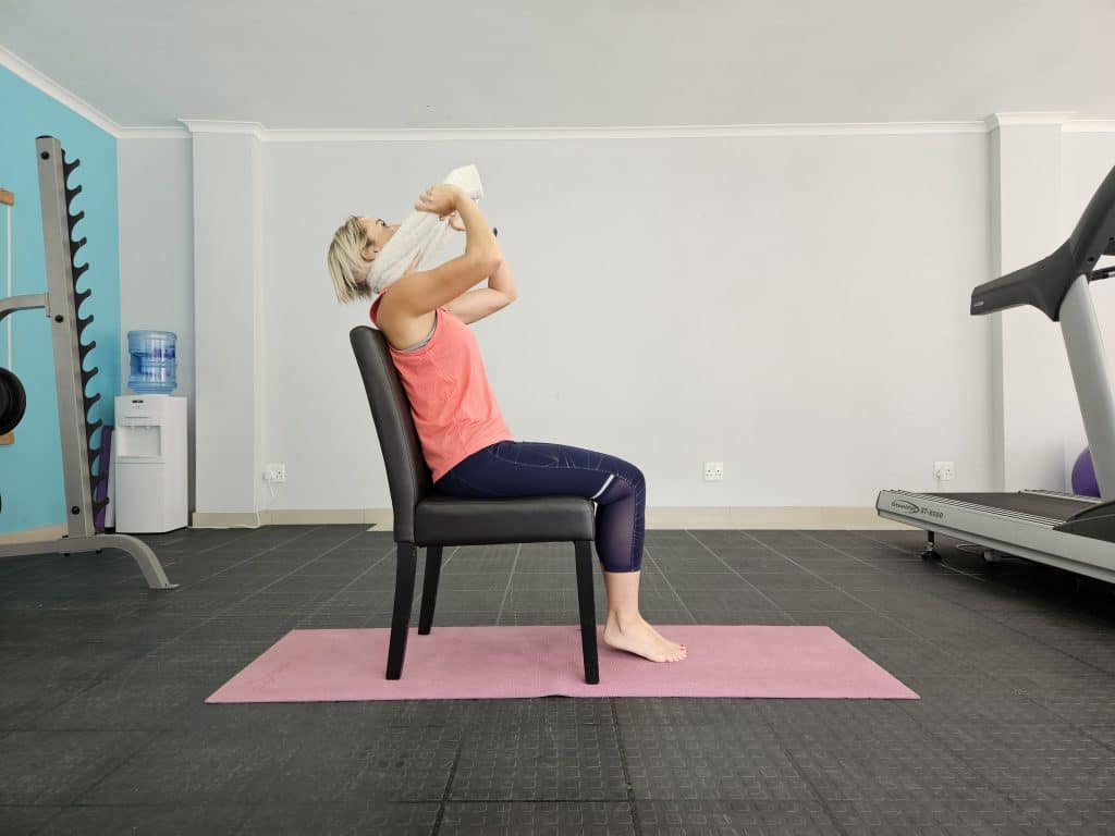 Seated Neck Towel Stretch-Neck Pain Exercises At Home