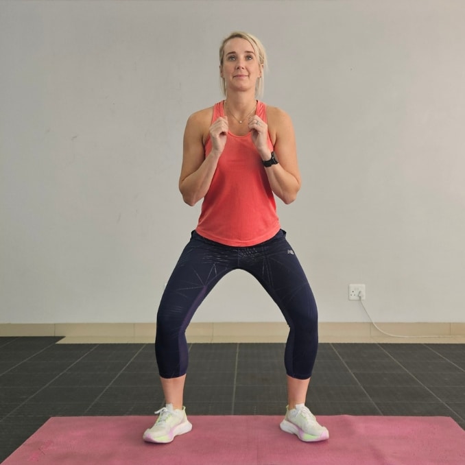 Squat to Overhead Reach - Energy Boosting Exercises