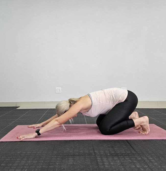 child’s Pose with Modified Plank Start - Shoulder Workout Routine