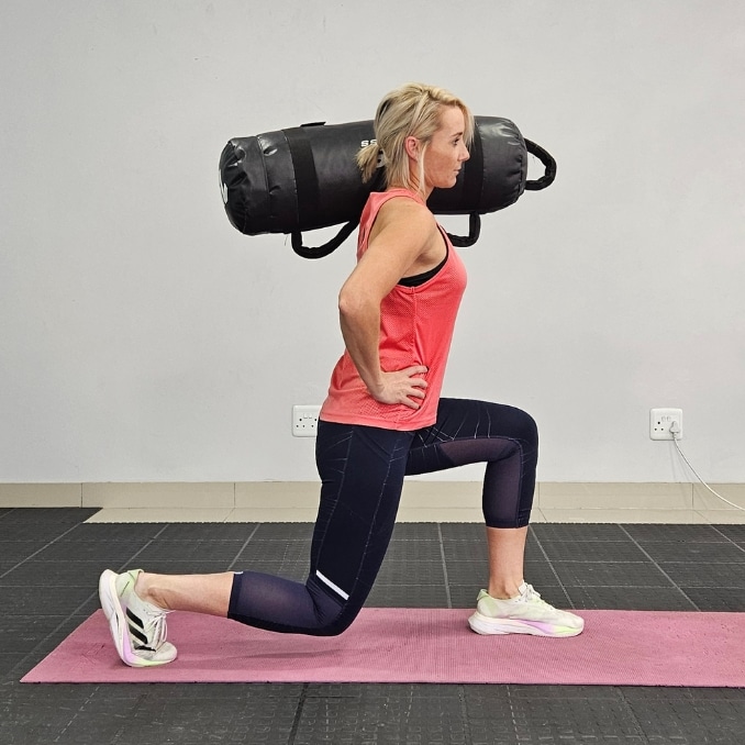 Sandbag Lunge - Sandbag Exercises